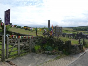 Pecket Well Mill with bicycle and bunting